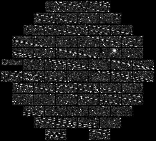 image of Starlink trails across a starfield